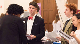 Students networking at the fall career fair
